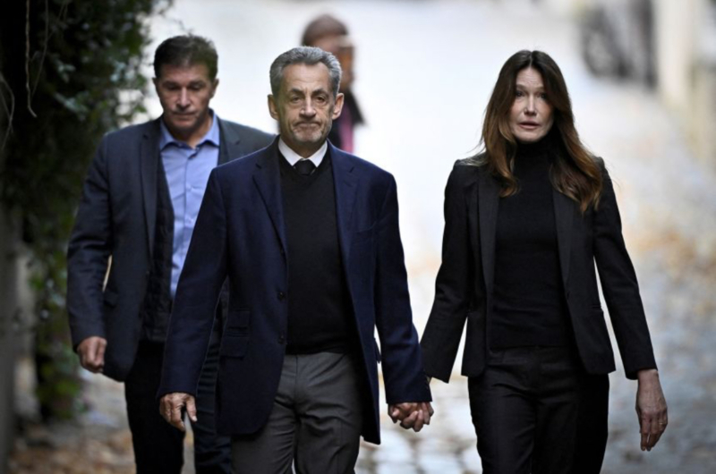 Former French President Nicolas Sarkozy arrives at prison to start five-year sentence Nicolas Sarkozy walks with his wife Carla Bruni-Sarkozy after leaving his residence to present himself to prison in Paris on October 21. Former French President Nicolas Sarkozy entered a prison in Paris on Tuesday on the first day of a five-year sentence, marking the first time a former leader of modern France has spent time behind bars. Sarkozy was driven to the prison complex on Tuesday morning, waving to his supporters as he left his house. The car driving him was surrounded by dozens of police motorbikes and vehicles, making its way to La Santé Prison in southern Paris. Sarkozy was sentenced to five years in jail for criminal conspiracy last month, for his role in a scheme to finance his 2007 presidential campaign with funds from Libya in exchange for diplomatic favors. The former president, who left office in 2012, intends to appeal but in the meantime is expected to occupy a cell either in solitary confinement or in the so-called “VIP wing” of La Santé prison complex. That wing is usually reserved for prisoners who are considered unsuitable to be kept among the prison’s general population, usually out of fears for their safety. They could be politicians, former police officers, members of far-right organizations or those tied to Islamist terror groups, CNN affiliate BFMTV reported. In a statement posted to X shortly after the car carrying him set off for prison, Sarkozy stressed that he is an “innocent man.” “As I prepare to step inside the walls of La Santé prison, my thoughts go out to the French people of all walks of life and opinions,” he said. “I want to tell them with my unwavering strength that it’s not a former president of the Republic being locked up this morning, it’s an innocent man,” he continued. The former leader said he will “continue to denounce this judicial scandal” but added that he is “not to be pitied because my wife and children are by my side, and my friends are countless.” On Tuesday morning, however, Sarkozy said he felt “a deep sorrow for France, which finds itself humiliated by the expression of a vengeance that has taken hatred to an unprecedented level.”