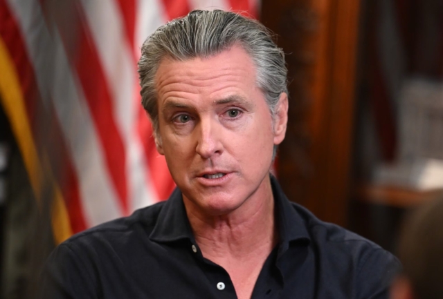 California Governor Gavin Newsom says President Trump is using the White House to promote companies he holds stock in and enrich his family.