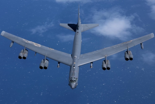 US nuclear-capable B-52 bombers fly alongside Japanese fighter jets in show of force, following Chinese and Russian drills.
