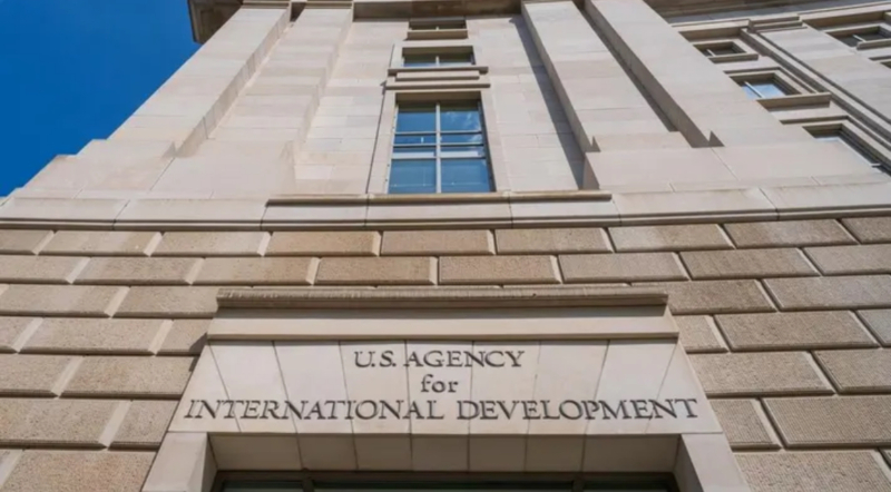 What To Know About Trump’s USAID Changes—After Elon Musk’s DOGE Accesses Classified Info Two security officers for the U.S. Agency for International Development were placed on leave after blocking officials with the “Department of Government Efficiency” (DOGE) from gaining access to classified information, multiple outlets reported, the latest issue at the foreign aid agency as the Trump administration reportedly tries to shutter it. Officials with DOGE, the new group run by billionaire Elon Musk, tried to physically enter USAID’s offices and access materials there including classified information, CNN first reported Sunday, and the two senior security officials who tried to stop them from doing so were placed on leave—with the Associated Press reporting the DOGE officials did ultimately get access to the classified materials, which they didn’t have the appropriate security clearance to access. Musk has repeatedly attacked USAID on X, formerly known as Twitter, saying Sunday in response to the CNN report, “USAID is a criminal organization. Time for it to die.” (There is no evidence of any criminal activity by USAID.) USAID was established in 1961 and has long been the primary federal agency for providing foreign aid, but multiple reports suggest President Donald Trump is now trying to shut down the agency as an independent entity and move its operations to be under the State Department. NBC News reported signs outside the agency’s building were removed Friday, with USAID’s website then going offline Saturday amid the reports and the agency’s account on X disappearing Sunday. Hundreds of USAID employees have been fired or furloughed, according to multiple reports, and the agency’s foreign aid work has already been suspended since Trump ordered a freeze on most foreign aid last week. The White House has not yet responded to a request for comment on the reports about DOGE seeking classified information, and USAID could not be reached for comment, with CNN reporting its public affairs team “was put on leave and locked out of their systems.” What To Watch For A formal Trump executive order on moving USAID to the State Department could come as soon as early this week, according to The Wall Street Journal. What Is Usaid? USAID provides humanitarian relief to foreign countries and assistance for issues like poverty and disease, as well as provides strategic assistance for foreign conflicts and supports developing countries’ economic growth, according to the Congressional Research Service. The agency employed more than 10,000 people prior to its recent reported cuts and provided more than $43 billion in assistance in fiscal year 2023 to more than 130 countries. Ukraine was the biggest recipient of USAID funding in FY2023, with the Congressional Research Service noting Congress has approved more than $46 billion in emergency funding to Ukraine, mostly through USAID, since its war with Russia began in February 2022. What Impact Would Shutting Down Usaid Have? Humanitarian groups have warned any move to dismantle USAID would carry dire consequences for the countries it supports, with Oxfam arguing, “Dismantling USAID would be a callous, destructive political power play that would have deadly consequences for millions of people living in dire humanitarian emergencies and extreme poverty.” While moving USAID’s work to the State Department could continue its aid to some extent, Oxfam argued dismantling the agency would be “recklessly throwing away USAID’s critical experience and strategic focus” on providing aid, and the organization “would expect to see less impact and less accountability to the American people.” Amnesty International executive director Paul O’Brien similarly said getting rid of the agency would “put the rights of millions of people around the world at greater risk as a result,” arguing foreign governments worldwide are “better equipped to meet their human rights obligations because of the technical and financial resources USAID provides.” Sen. Chris Murphy, D-Conn., a sharp Trump critic, argued on X that in addition to decimating foreign aid for issues like feeding malnourished children, anti-terrorism programs and public health, the move would also bolster China, as foreign countries now stripped of U.S. aid may turn to China for assistance and “cut more deals with” the country’s government, giving Beijing more power. Contra The State Department issued a waiver Thursday for some forms of emergency humanitarian aid amid the Trump administration’s broader foreign aid freeze, saying it “applies to core life-saving medicine, medical services, food, shelter, and subsistence assistance, as well as supplies and reasonable administrative costs as necessary to deliver such assistance.” Humanitarian organizations said they were still trying to figure out what aid would fall within the waiver’s scope, The Washington Post reported Thursday, also noting many organizations had already terminated employees by the time the waiver was issued. Is Trump Shuttering Usaid Legal? Democrats have warned Trump’s apparent move to shut down USAID and move it under the State Department would be unlawful, as any shutdown of a federal agency would have to be approved by Congress. Trump “cannot unilaterally close a federal agency,” Murphy said Saturday, calling Trump’s attack on the agency “another assault on the Constitution,” while Senate Minority Leader Chuck Schumer, D-N.Y., said Friday the move would be “illegal and against our national interests.” Democratic lawmakers who serve as the ranking members on committees concerning foreign relations and national security sent a letter to USAID Acting Administrator Jason Gray on Friday expressing concerns about Trump’s apparent moves to hamstring the agency, which noted the agency is, “by statute, an independent establishment outside of the State Department.” “Any proposal to modify that structure would require an Act of Congress,” the lawmakers argued. It still remains to be seen if Democrats or humanitarian groups will file a lawsuit should Trump try to unilaterally shutter USAID, and if they would prevail in court given the Supreme Court’s 6-3 conservative tilt. Can The State Department Do Usaid’s Work? Former USAID officials cited by CNN disagreed with the Trump administration’s reported decision to move USAID’s work to the State Department, which is more focused on foreign relations than humanitarian assistance. The State Department doesn’t “have the capacity, the expertise, the training to do that kind of work,” one former senior USAID official told CNN, arguing USAID’s work “is a completely separate line of effort that is undertaken on the ground.” USAID is the only government agency working in foreign countries “that has been able to get out beyond the wire and actually have a deeper understanding of the places in which we work,” the anonymous official added, arguing that without it, the U.S. is “basically going to be punching with one arm behind our back” in terms of foreign policy. Was The U.s. Spending Millions On Condoms In Gaza? The Trump administration has partially defended its move to halt foreign aid by claiming the Biden administration was wasting federal funds by spending $50 million on “condoms in Gaza,” which White House press secretary Karoline Leavitt said was a “preposterous waste of taxpayer money.” There is no evidence suggesting that expenditure actually happened, however, the Post reports, noting that while the Biden-era State Department signed a $50 million deal for healthcare in Gaza, that did not include supplying any condoms. Key Background Trump’s reported efforts to shut down USAID come as his administration, with the help of Musk and DOGE, has broadly vowed to cut government spending and make significant moves to put federal agencies’ work more in line with his ideological beliefs. In addition to freezing foreign aid, the government also issued a memo halting almost all federal grant spending—which it later walked back before the memo was blocked in court—and has offered buyouts to millions of government employees. Trump has also pushed an “America First” foreign policy that’s been largely critical of using U.S. resources to help out other countries, and withdrew the U.S. from the World Health Organization and the Paris Climate Agreement on the first day of his presidency. Sunday’s reports of DOGE officials seeking access to USAID’s information comes after multiple outlets reported Saturday that Musk allies now have access to the Treasury Department’s payment systems, which The New York Times reports have traditionally been “closely held” because they include “sensitive personal information” about Americans who receive federal money through programs like Social Security or tax refunds. The Times reports civil servant David Lebryk was placed on leave and “suddenly retired,” which multiple outlets reported came after he initially denied Musk’s allies access to the system.