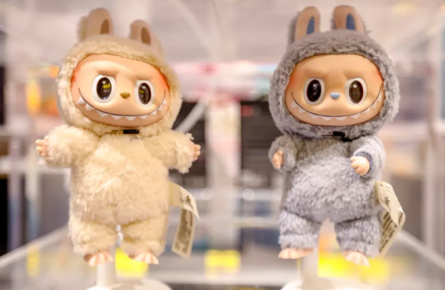 pop-marts-wang-ning-is-chinas-10th-richest-thanks-to-labubu-mania-pop-marts-labubu-triggers-buying-spree-labubu-dolls-on-display-at-a-pop-mart-store-in-shanghai-around-the-world